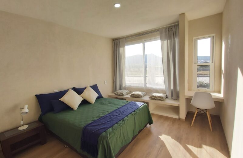 Habitación con cama queen size
